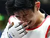 Taekwondo athlete Kang Sang-hyun reacts after winning bronze medal during the Asian Games held in Japan on Oct. 3.