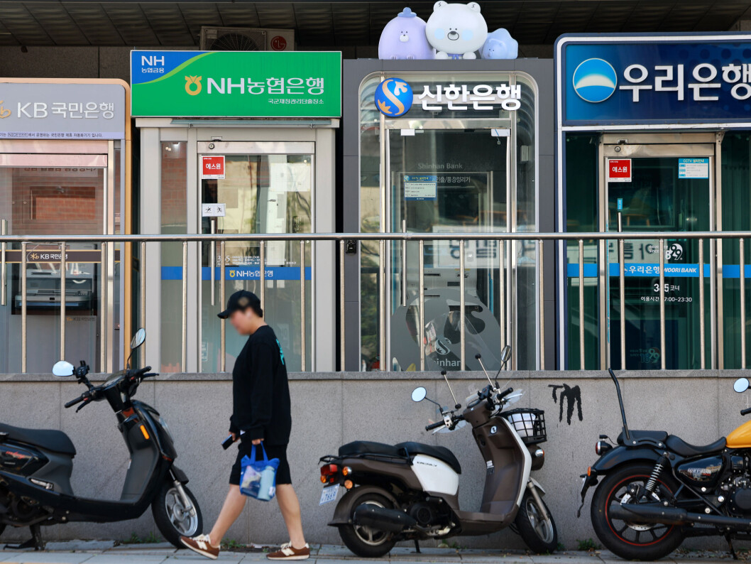 Photograph accompanying Customers of seven hacked Korean lenders start recruiting for class-action suits