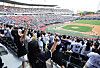 Baseball fans cheer for clubs that they support during a KBO match between the KT Wiz and the Lotte Giants in Suwon, Gyeonggi, on Oct. 5.