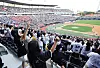 Baseball fans cheer for clubs that they support during a KBO match between the KT Wiz and the Lotte Giants in Suwon, Gyeonggi, on Oct. 5.