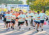 Runners, including marathoner Lee Bong-ju, front, corporate officials and runners participate in a marathon held at World Cup Park in Mapo District, western Seoul, on Oct. 4.