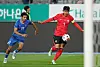 Son Heung-min, right, dribbles a ball during a friendly match against Uzbekistan in Yongin, Gyeonggi, on Oct. 6.