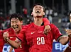 Son Heung-min, left, and Oh Se-hun react after scoring a goal during a friendly match against Uzbekistan in Yongin, Gyeonggi, on Oct. 6.