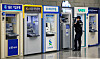 Automatic teller machines for various banks are installed in Seoul on Oct. 6.