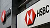 Two HSBC logos are displayed on an office building overseas on July 25, 2025.