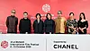 Seven competition jury members pose beneath the Busan International Film Festival backdrop.