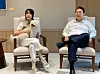 Ousted President Yoon Suk Yeol, right, and his wife, Kim Keon Hee, sit in chairs at the former presidential office in Yongsan, central Seoul, in a photo posted on Facebook on May 29, 2022.