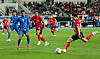 Cho Hyun-taek, a 25-year-old defender, right, kicks a ball during a friendly match against Uzbekistan in Yongin, Gyeonggi, on Oct. 6.