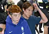 Goalkeeper Jo Hyeon-woo, left, arrives at Incheon International Airport after early-exit from group stage match from the FIFA World Cup 2026, with manager Hong Myung-bo on June 30.