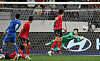 Goalkeeper Jo Hyeon-woo makes a save during an international friendly against Uzbekistan in Yongin, Gyeonggi, on Oct. 6.