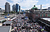 People crowd outdoor plaza in front of Seoul Station in central Seoul on Aug. 15, 2025.