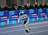 A robot competes in the 400m during the World Humanoid Robot Games in Beijing, Sunday, Aug. 23, 2026. (AP Photo/Achmad Ibrahim)