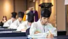 Contestants engage in a writing contest as part of the King Sejong Institute Foundation’s annual training program on Oct. 7.
