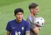 Footballer Kim Min-jae, front, and interim manager Robert Moreno are seen in a photo taken on a training field in Cheonan, South Chungcheong, on Sept. 22.