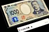 Holograms are seen on the new Japanese 1,000 yen banknote as the new note is displayed at a currency museum of the Bank of Japan on July 3, 2024, in Tokyo, Japan.