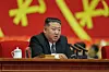 North Korean leader Kim Jong-un speaks during the regime's gathering on Sept. 21, in a photo carried by Rodong Sinmun.