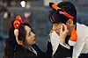Chae Soo-bin and Kim Young-kwang in period costumes share a playful backstage moment.
