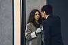 Na Bo-bae and Baek Ho-rang face each other in a tense doorway scene from Take charge of my heart.