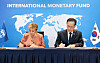 Minister of Finance and Economy Lee Hyoung-il, right, and Managing Director of International Monetary Fund Kristalina Georgieva sign a document for AI partnership between Korea and the international financial organization in Bangkok on Oct. 18.