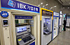 Automatic teller machines operated by commercial banks are seen in Seoul on Oct. 14.