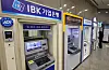 Automatic teller machines operated by commercial banks are seen in Seoul on Oct. 14.