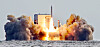 The Korean military conducts the third test launch of its domestically developed solid-fuel space rocket from a barge off the southern coast of Jeju Island, on Dec. 4, 2023.