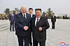 North Korean leader Kim Jong-un, right, holds hands with Belarusian President Alexander Lukashenko in Pyongyang on March 25 in a photo carried by the regime-controlled Korean Central News Agency.