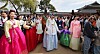 A group of people wearing hanbok (traditional Korean attire) are seen inside Gyeongbok Palace in central Seoul on Oct. 19.