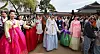 A group of people wearing hanbok (traditional Korean attire) are seen inside Gyeongbok Palace in central Seoul on Oct. 19.