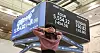 A person clutches the back of their neck at the Korea Exchange in western Seoul on Oct. 15 as the Kospi plunges 454.59 points, or 7.57 percent, to close at 5,554.22.