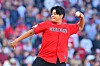 Choo Shin-Soo, former player for the Cleveland Guardians, throws the ceremonial first pitch ahead of the Guardians taking on the Tampa Bay Rays during the American League Championship Series at Progressive Field on Oct. 18.