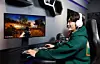 A person plays a computer game on an LG Display gaming monitor in an undated photo.