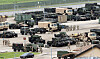 Military trucks and equipment are seen at Camp Humphreys in Pyeongtaek, Gyeonggi, on Aug. 17.