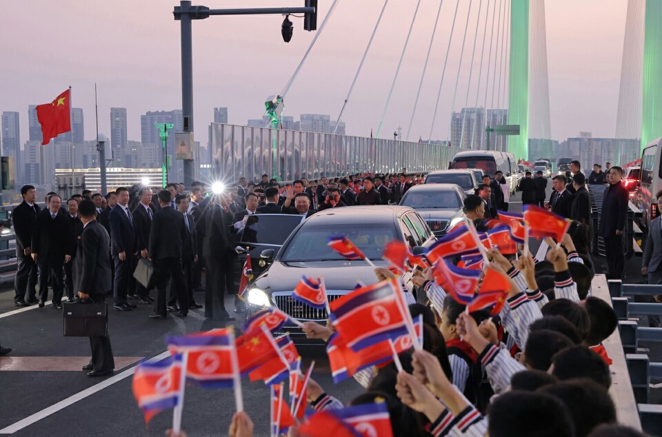 North Korean leader Kim Jong-un’s motorcades cross the New Yalu River Bridge in Dandong, China, on Oct. 24, in this