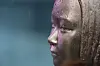 A bronze statue symbolizing victims of Japan's wartime sexual slavery stands in central Seoul on Aug. 14.
