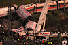 Emergency services work at the scene of a collision between two trains in Urda, Spain, on Wednesday, Oct. 28, 2026. (AP Photo/Manu Fernandez)/2026-10-29 05:55:43/