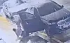 A woman in her 40s is forcibly dragged away by a man in his 60s who had been reported to police for stalking and dating violence on Oct. 12.